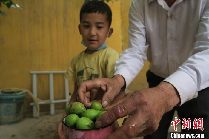 圖為進(jìn)藏先遣英雄連誓師地原址所在的新疆維吾爾自治區(qū)和田地區(qū)于田縣普魯村現(xiàn)貌?！畛坛?攝